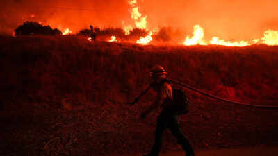 El Nino is here and scientists fear it'll be big, bad and costly with heat, floods, droughts, fires