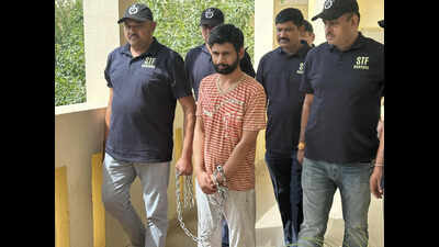 Lawrence aide extradited from Georgia after 18-month pursuit