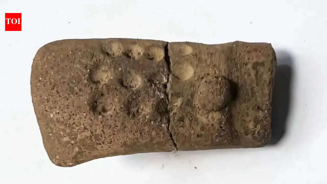 11 mysterious dots on a 2,700-year-old figurine are forcing archaeologists to rethink early writing in Guatemala