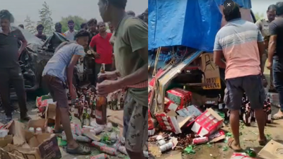 Beer-laden pick-up overturns in Odisha's Balasore, crowd carries away beer cartons