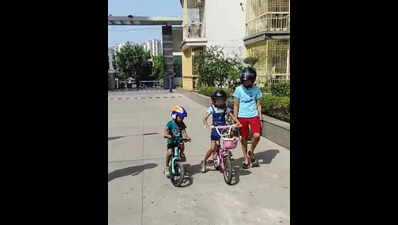 At this Noida condo, people are walking with helmets on