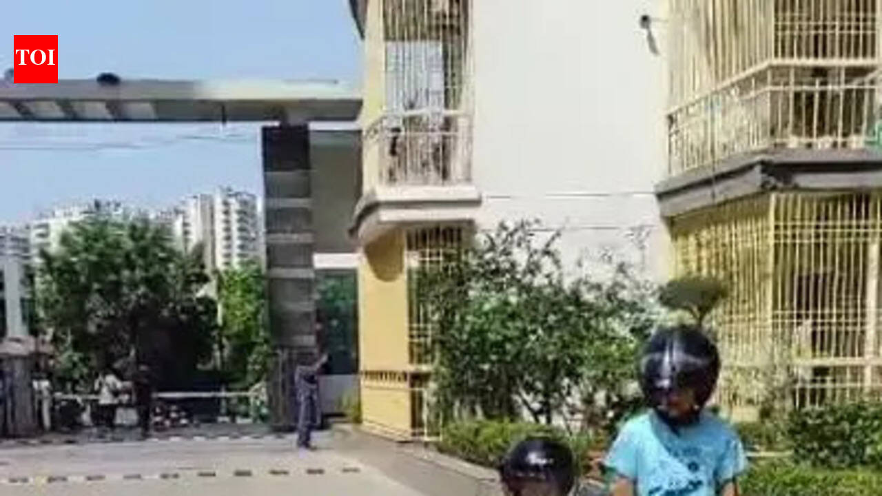 At this Noida condo, people are walking with helmets on