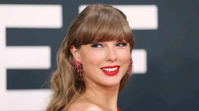 Taylor Swift stole the show at Patrick Mahomes' $504M contract signing and it was a toddler who noticed her first