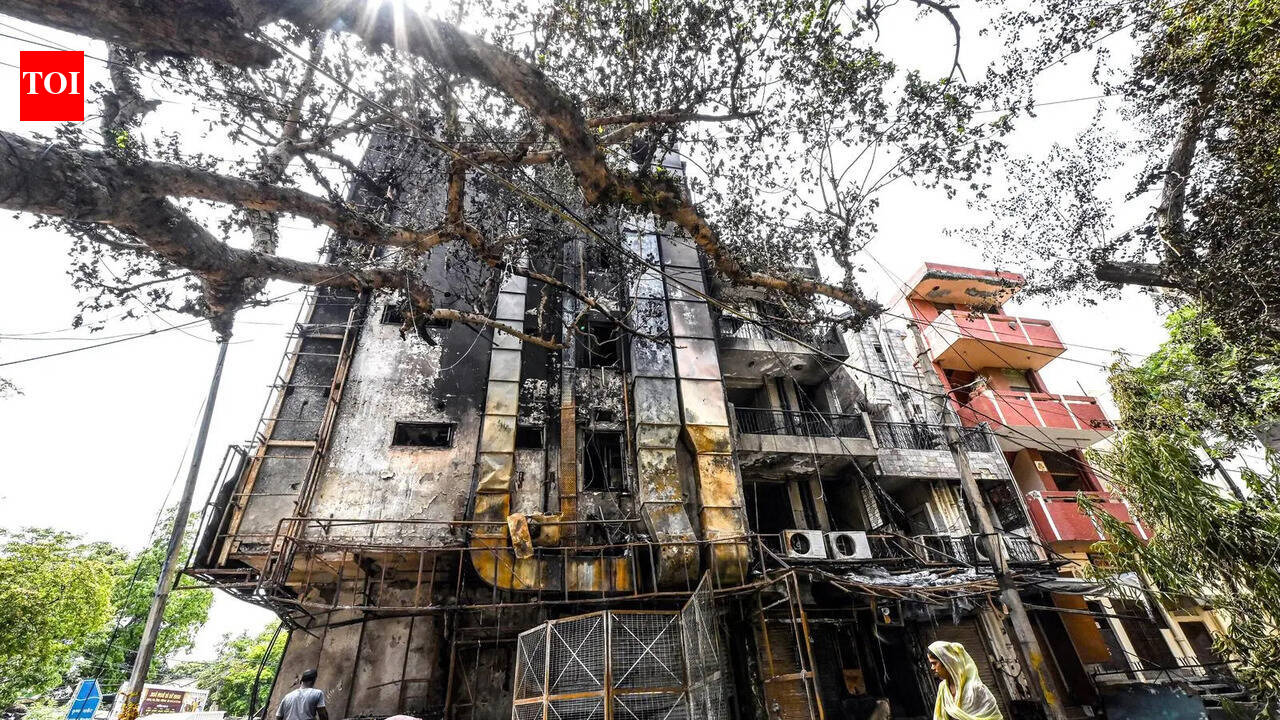Elderly Woman Rescued as Fire Tears Through Multi-Storey Building