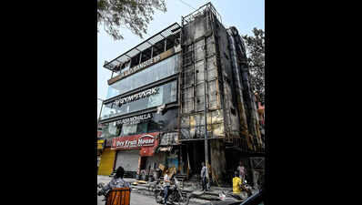 Elderly Woman Rescued as Fire Tears Through Multi-Storey Building