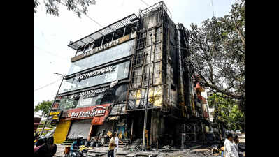 Elderly Woman Rescued as Fire Tears Through Multi-Storey Building