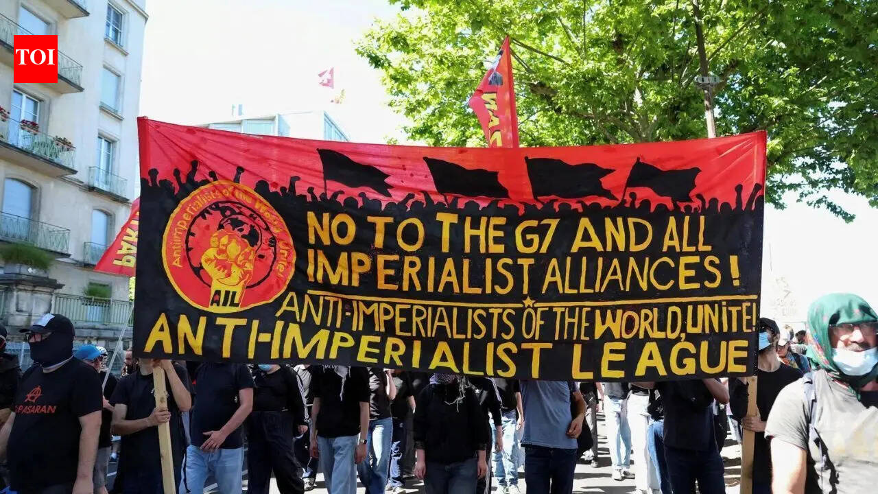Tear gas, burning Tesla and smashed windows: 20,000 protest G7 summit in Geneva ahead of Trump's arrival