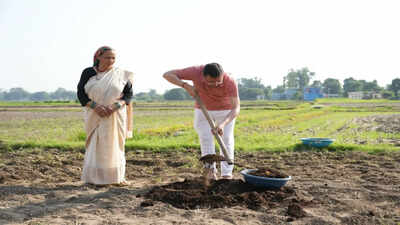 Uttarakhand CM Dhami promotes organic farming, ploughs field at private residence in Khatima