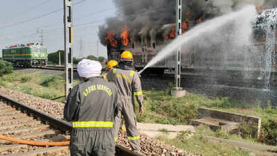Freight train wagon ferrying cars gutted in fire on DFC in Firozabad