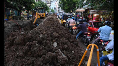 Open trenches due to ongoing UGD work choke traffic in Munichalai Junction