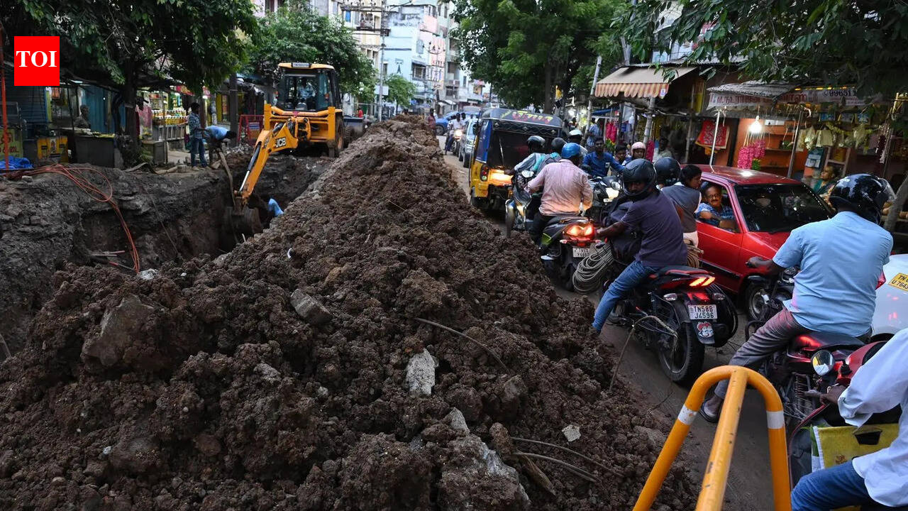 Open trenches due to ongoing UGD work choke traffic in Munichalai Junction
