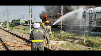 Train wagon ferrying cars gutted in fire in Firozabad