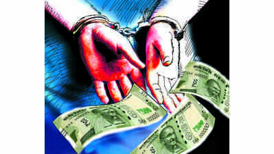 Talati, aide caught taking Rs 40,000 bribe in Navsari district