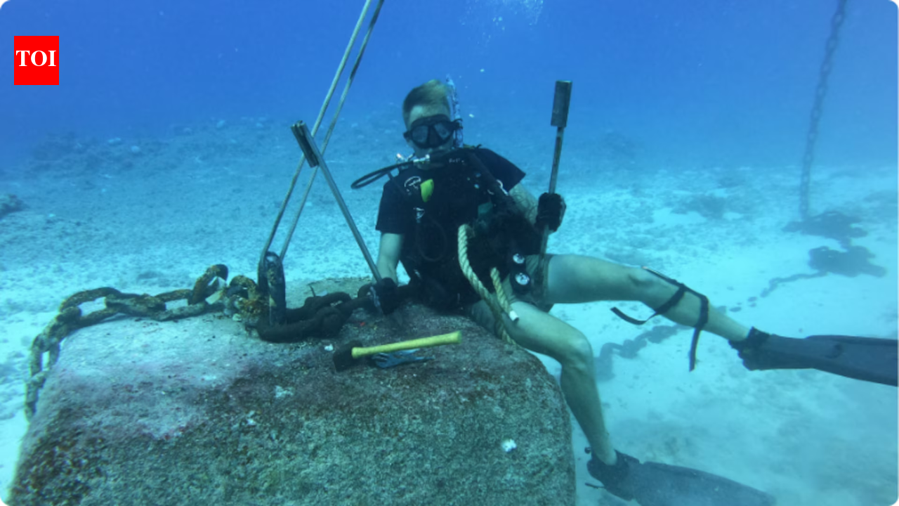 From repairing buoys to making history: Meet the US Coast Guard diver who became the first 'Coastie' to complete the Navy's toughest diving course