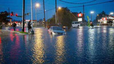 Tropical storm remnants drench Gulf states after tornadoes hit the Midwest