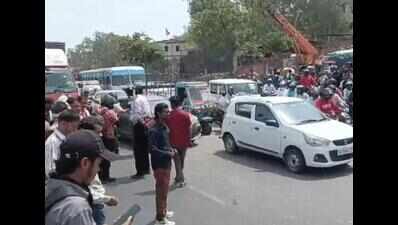 Bus runs over food-delivery driver in city