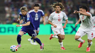 Japan make World Cup history with emphatic 4-0 win over Tunisia