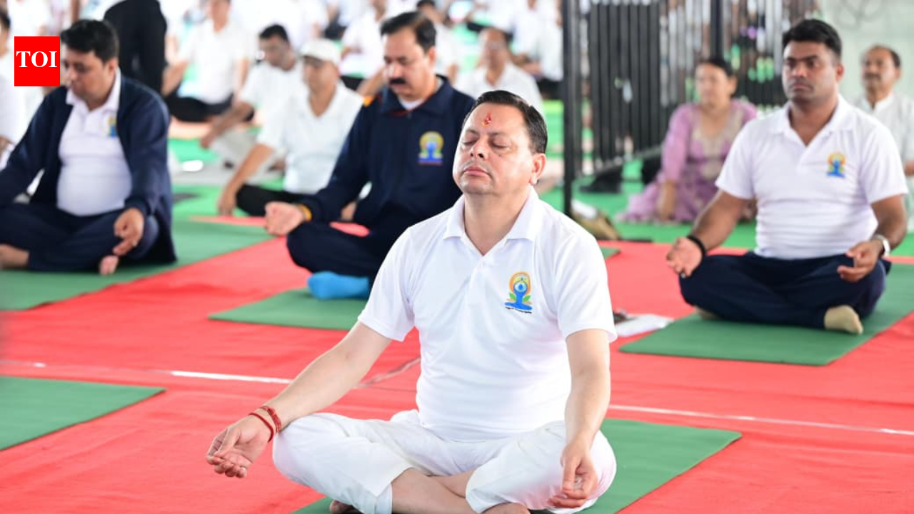 Uttarakhand CM Pushkar Singh Dhami joins Yoga Day celebrations in Banbasa