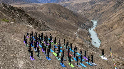 From mountains to plains to high seas, Indian forces take part in yoga sessions pan-India; Rajnath performs yoga with 1,000 soldiers in Shillong, calls it ‘holistic science’