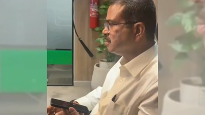  Dharmendra Pradhan speaks to parents of NEET-UG aspirant taking re-exam while recovering from major surgery