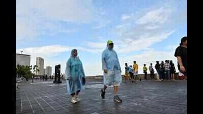 Pre-monsoon showers soak Mumbai, offer slight relief from hot and humid weather