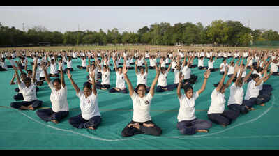 International Yoga Day: City bends, breathes and reflects