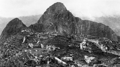 In 1911, Hiram Bingham climbing a ridge with local guides unexpectedly discovered Machu Picchu