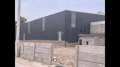 Houses and walls choke Aravali water channels feeding dam & Surajkund lake