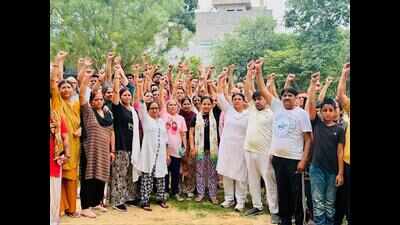 Firm charging for waste collection, residents stage protest