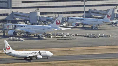 Japan braces for twin tropical storms, airlines cancel over 100 flights
