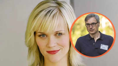 'He's there for her': Reese Witherspoon and Oliver Haarmann make romance official at 'Elle' premiere in NYC
