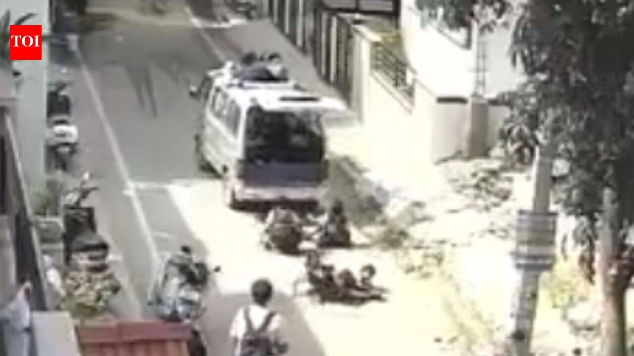 Watch: Bengaluru school van door flies open, children tumble onto road in seconds