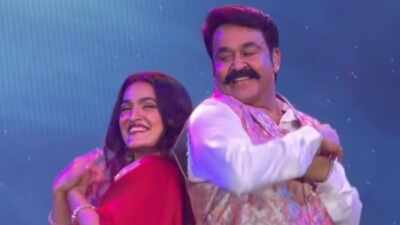 Mohanlal and Saniya Iyappan groove to 'Megham Karukatha' in Germany; Actress calls 'Drishyam' actor 'Pookie Lalettan'