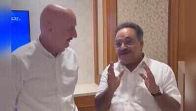 Poll campaign remark in focus as Samik Bhattacharya and Anupam Kher share a chuckle over actor’s baldness