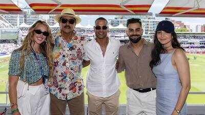 virat-kohli-anushka-sharma-cheer-for-team-india-at-womens-t20-world-cup-clash-pose-with-ravi-shastri-and-shikhar-dhawan-at-lords.jpg
