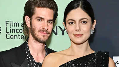 Andrew Garfield and Monica Barbaro pack on the PDA during a romantic dinner date in Rome - PICS