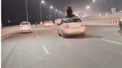 Man booked after video shows him sitting on roof of moving car on Gurgaon highway