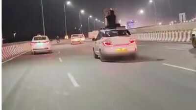 Man booked after video shows him sitting on roof of moving car on Gurgaon highway