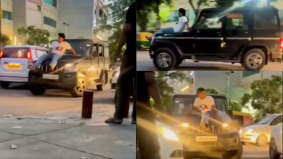 Video of man performing stunt on speeding car's bonnet in Gurgaon goes viral; police probe on