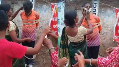 Woman ties drunk husband to pole, seals his mouth with tape during liquor shop protest in Madhya Pradesh