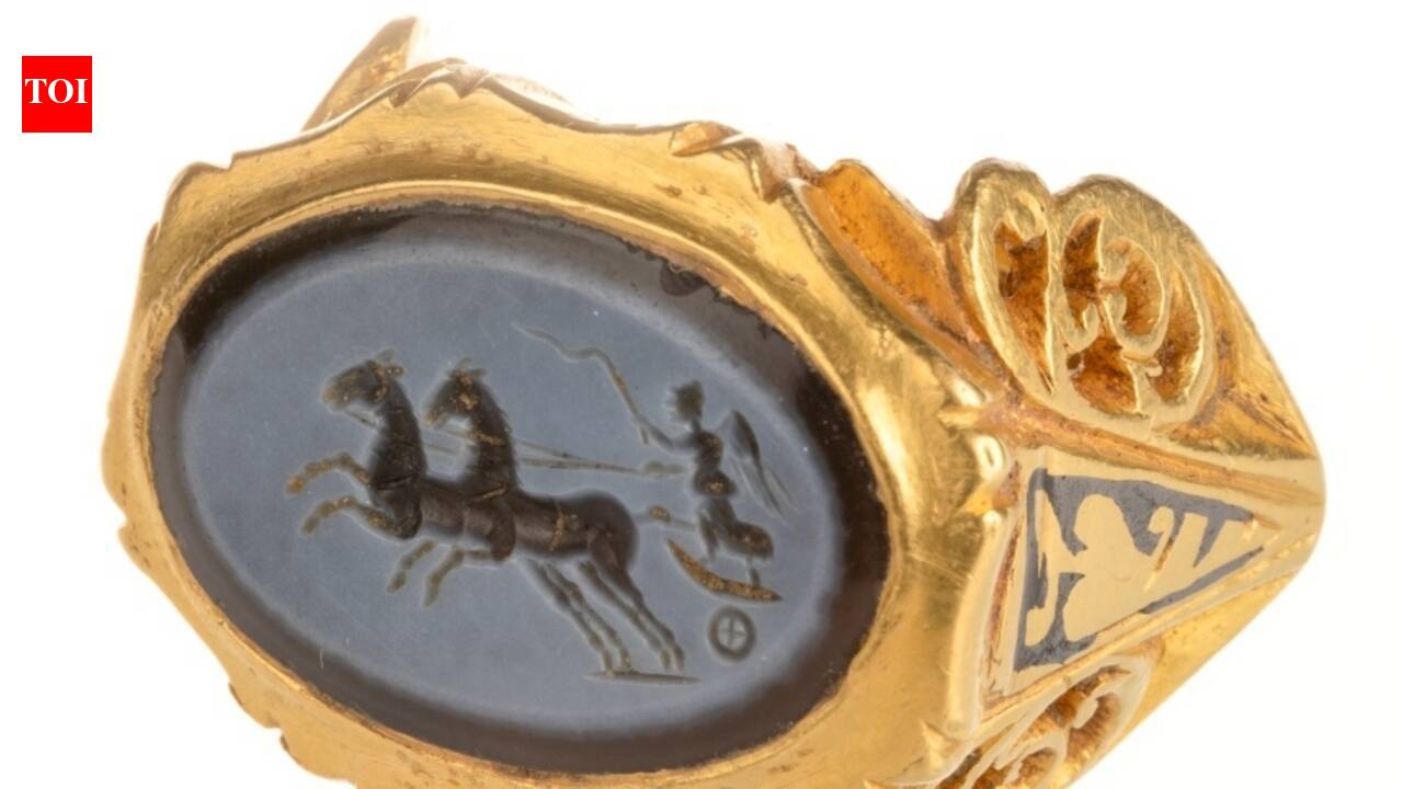 An amateur detectorist uncovered a spectacular Roman gold ring buried for 1,700 years with a hoard of 297 coins, shedding new light on the site's ancient past