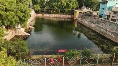 Residents clean HR&CE temple tank in Woraiyur