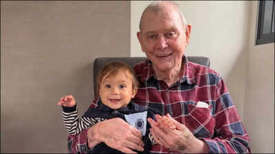 John Farnham celebrates 77th birthday with grandson: Son James shares rare update - ‘We love you so much’