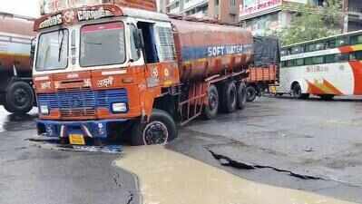 Moving tanker stuck as another road caves in