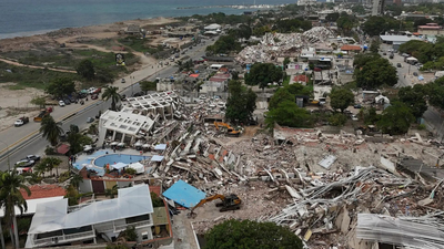 Eight days after quakes, a guard is pulled alive from Venezuelan building