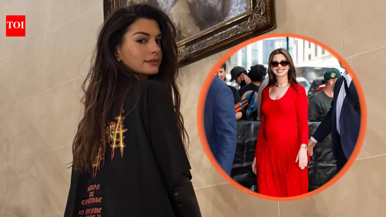 Anne Hathaway reacts after wearing maternity jumpsuit backwards: "I did?"