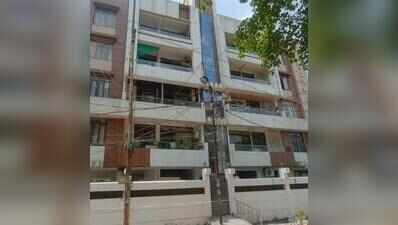 Four-storey apartment sealed as basement caves in