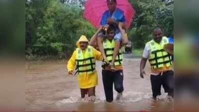Raigad cop carries 72-year-old woman on shoulder, wades through flooded road to reach her to safety