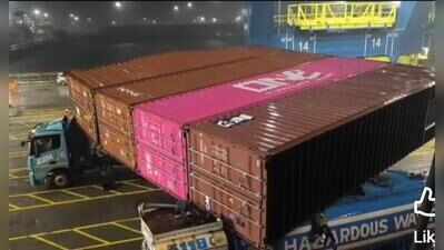 Containers stacked on shipping vessel fall on 2 trucks at JNPA terminal amid heavy rain; one worker killed, another injured