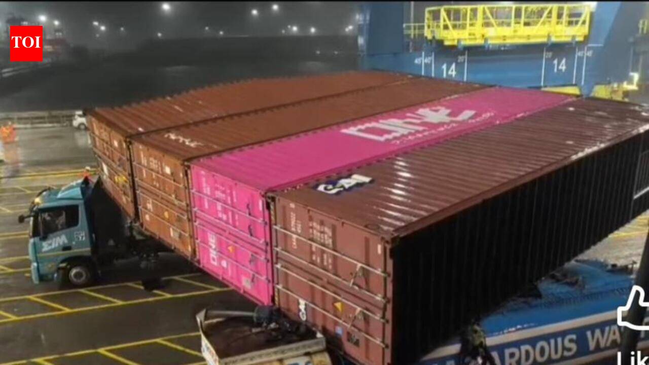 Containers stacked on shipping vessel fall on 2 trucks at JNPA terminal amid heavy rain; one worker killed, another injured